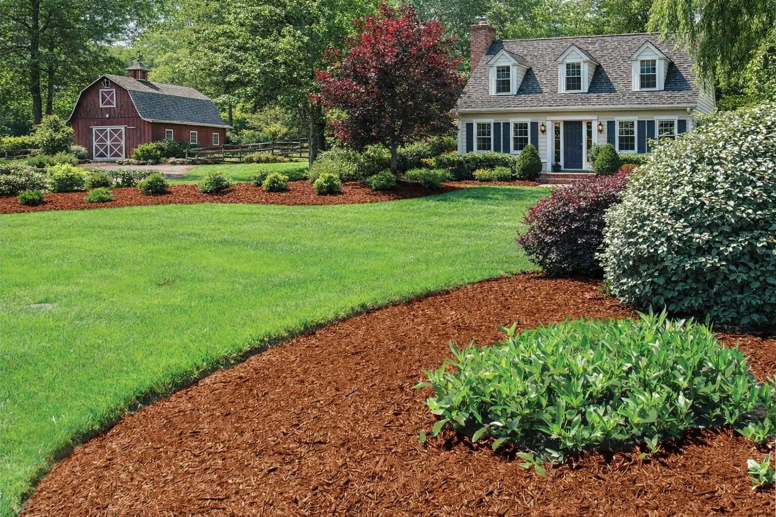 Clean planting bed edges with fresh cedar mulch application in Coeur d'Alene