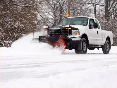 Commercial snow removal and ice management service featuring winter response coverage for safe access and reduced slip risk in Post Falls, Coeur d'Alene, and North Idaho