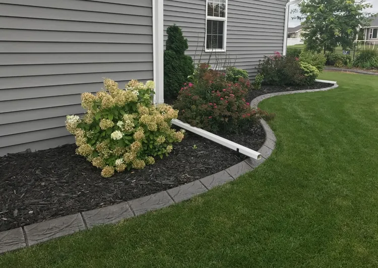 Landscaping project image featuring seasonal color layering supporting cohesive outdoor-room flow in Post Falls, Coeur d'Alene, and North Idaho, gallery view 1