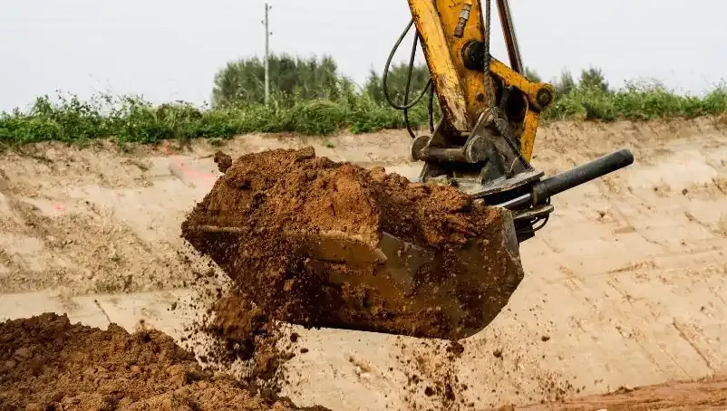 Excavation and grading work for site preparation featuring demolition clearing and export-ready site cleanup in Post Falls, Coeur d'Alene, and North Idaho