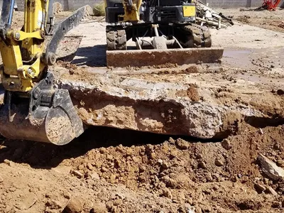 Excavation and grading work for site preparation featuring demolition clearing and export-ready site cleanup in Post Falls, Coeur d'Alene, and North Idaho