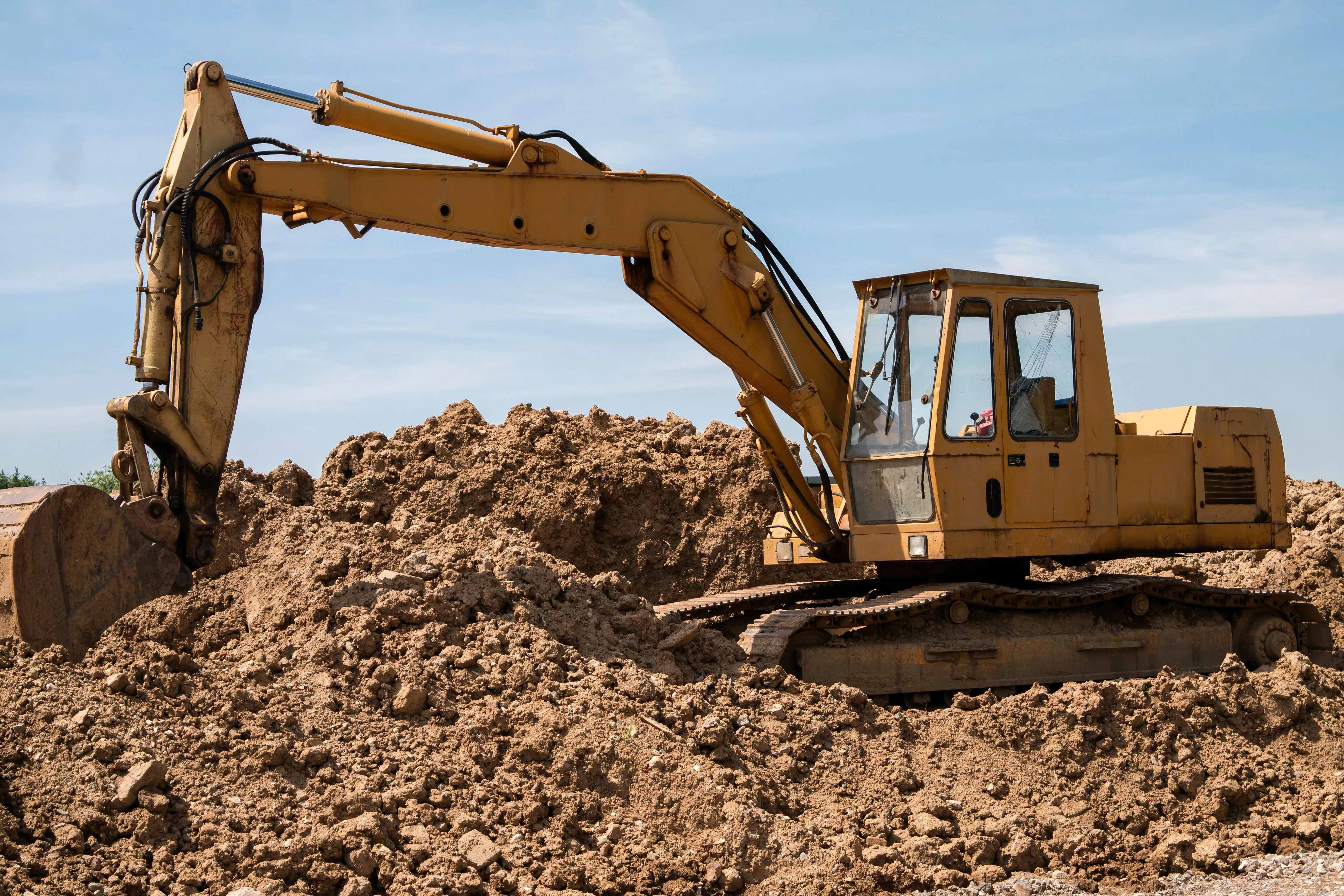 Excavation and grading work for site preparation featuring precision grading for drainage direction and compaction readiness in Post Falls, Coeur d'Alene, and North Idaho