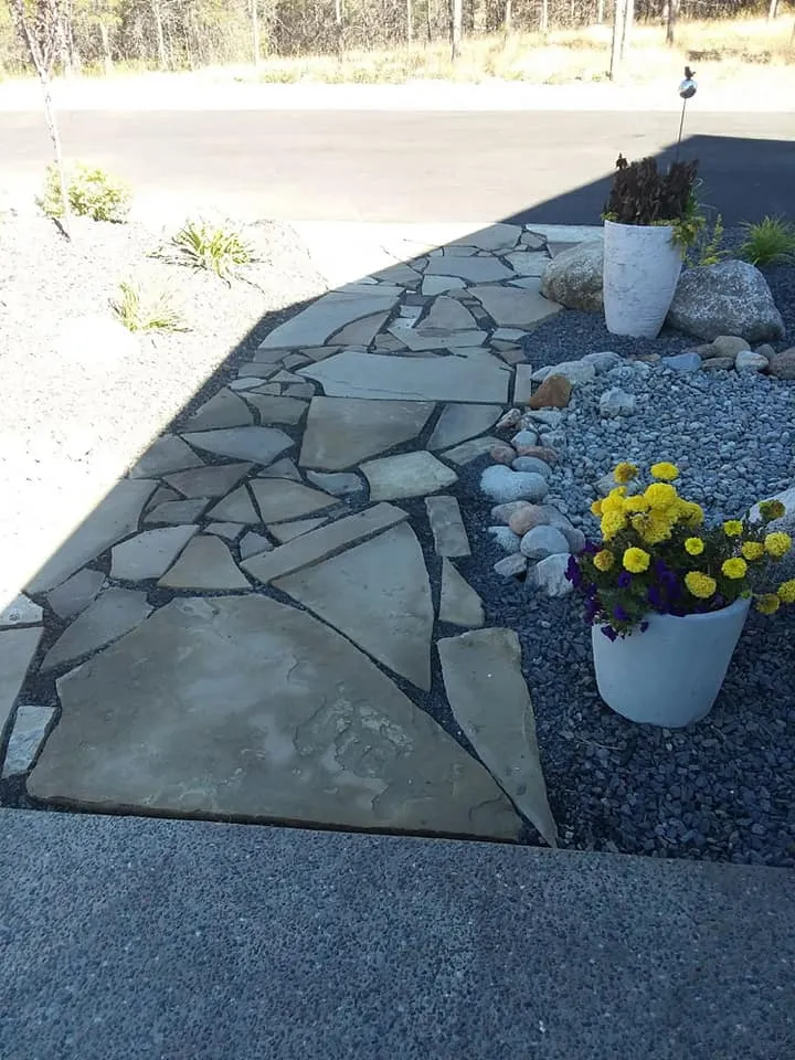 Landscaping project image featuring planting choreography supporting balanced texture and depth in Post Falls, Coeur d'Alene, and North Idaho