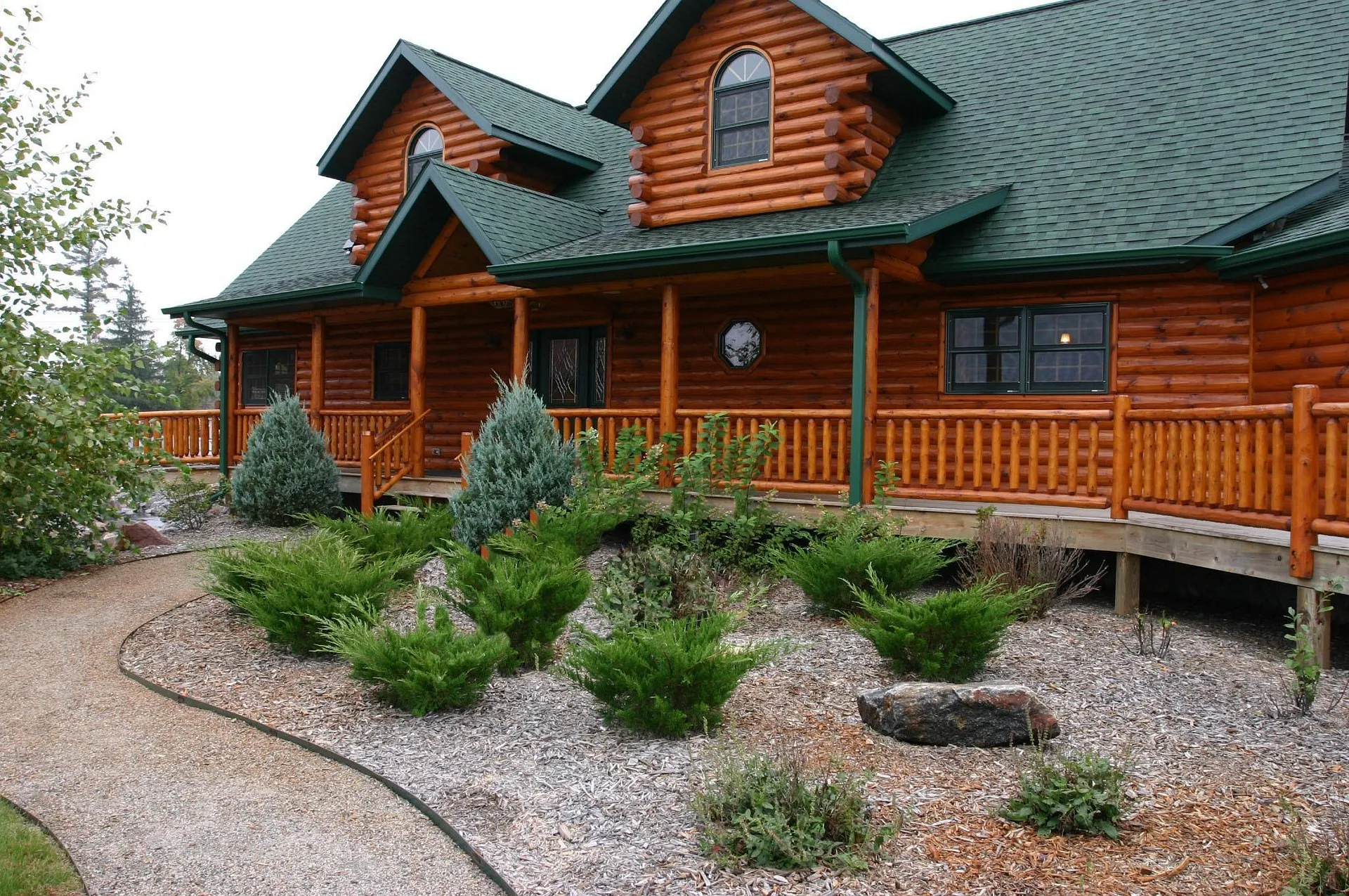 Residential landscaping design and planting project featuring native palette planning supporting balanced texture and depth in Post Falls, Coeur d'Alene, and North Idaho