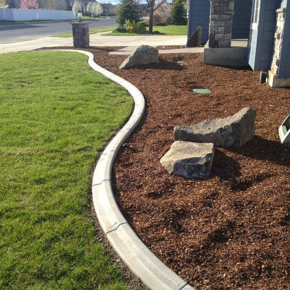 Landscaping project image featuring planting choreography supporting long-term plant performance in Post Falls, Coeur d'Alene, and North Idaho