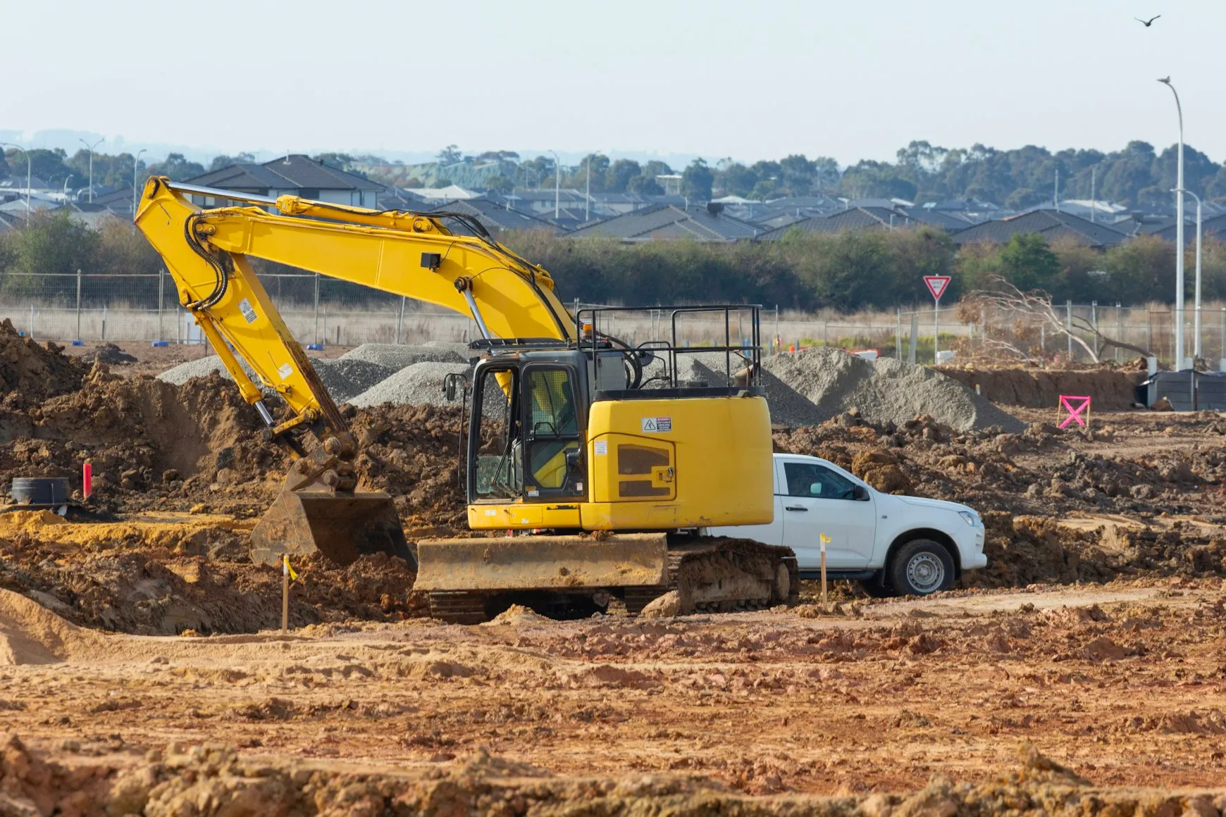 Excavation and grading work for site preparation featuring grade verification supporting foundation-readiness in Post Falls, Coeur d'Alene, and North Idaho