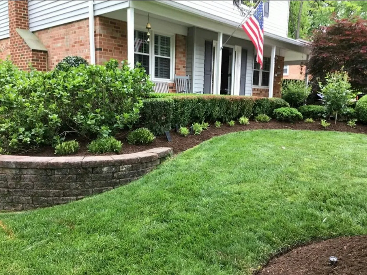Residential landscaping design and planting project featuring planting choreography supporting cohesive outdoor-room flow in Post Falls, Coeur d'Alene, and North Idaho