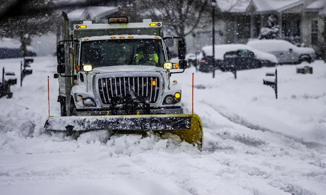 Commercial snow removal and ice management service featuring winter response coverage for safe access and reduced slip risk in Post Falls, Coeur d'Alene, and North Idaho