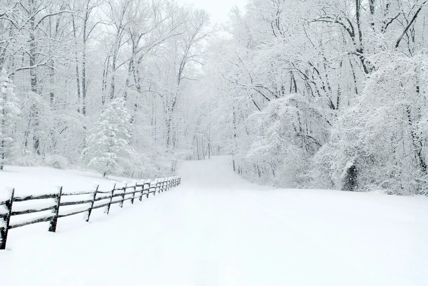 Commercial snow removal and ice management service featuring winter response coverage for safe access and reduced slip risk in Post Falls, Coeur d'Alene, and North Idaho